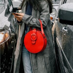 Red Leather Circle Bag by Manjerica a Portuguese Designer.